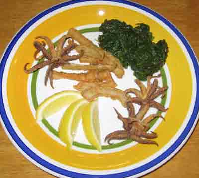 Kalamarakia Tiganita - Deep Fried Calamari is a popular dish in Greece
