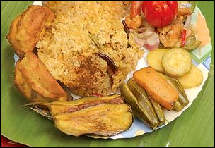 Kichiri ready to be eaten with roasted potato for lunch