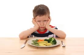 Kid and Vegetables