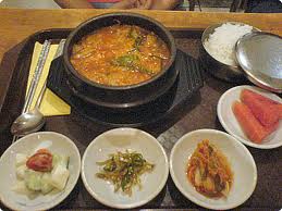 Kimchee served as a side dish to Beef stew and rice