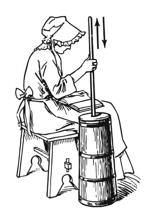 A housewife using a butter plunger to churn out butter from cream