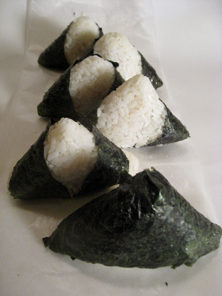Onigiri also known as Omusubi or nigiri Meshi, are popular Japanese take away snacks