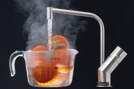 Warming up food under steaming hot water Warming up food under steaming hot water