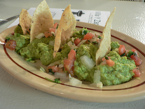 Yumm! the adventures of digging the tortillas into Guacamole...heaven
