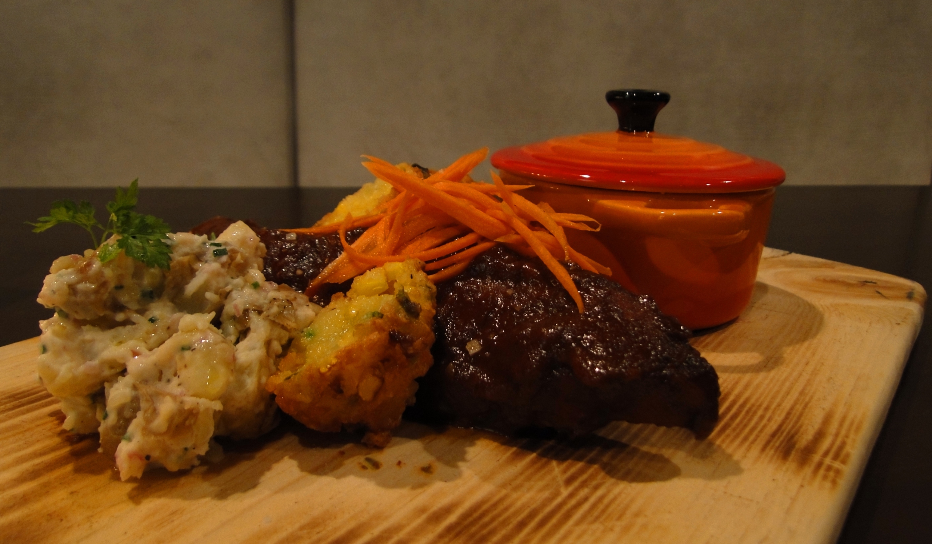 Chipotle smoked pork ribs with Jalapeño cheddar corn fritters, Bacon baked beans and Potato salad.. Chipotle smoked pork ribs with Jalapeño cheddar corn fritters, Bacon baked beans and Potato salad.. picture