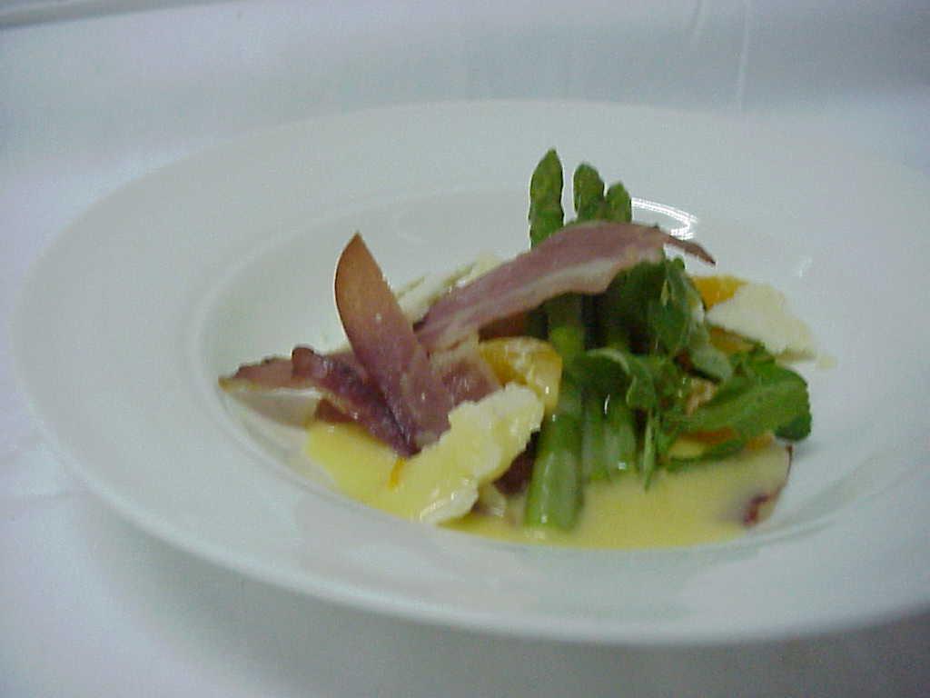 Parma ham, asparagus tips with maltaise sauce and Parmesan Parma ham, asparagus tips with maltaise sauce and Parmesan picture