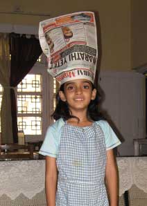 My little doll- loves to help me in the kitchen